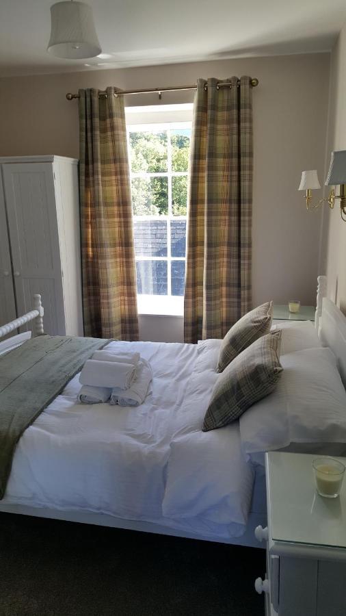 Central Bar Guesthouse Cushendall Bagian luar foto