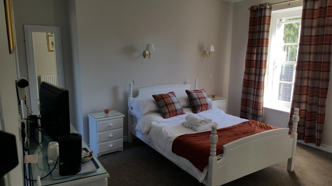 Central Bar Guesthouse Cushendall Bagian luar foto